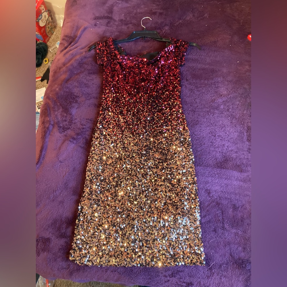 B.Smart sequin dress.